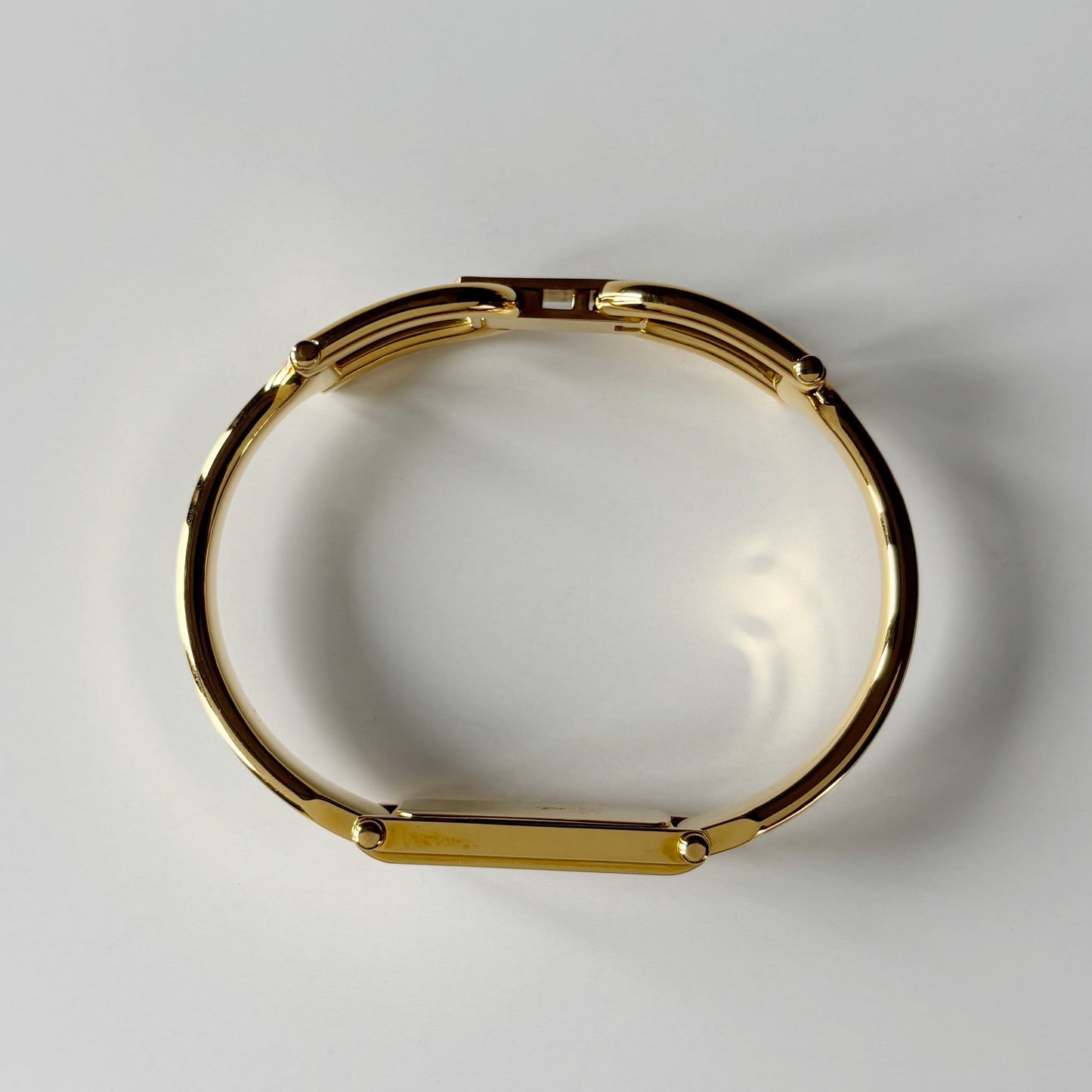 Gucci 1990s Seashell Rectangular Dial Gold Plated Bangle Watch