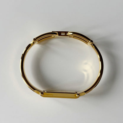 Gucci 1990s Seashell Rectangular Dial Gold Plated Bangle Watch
