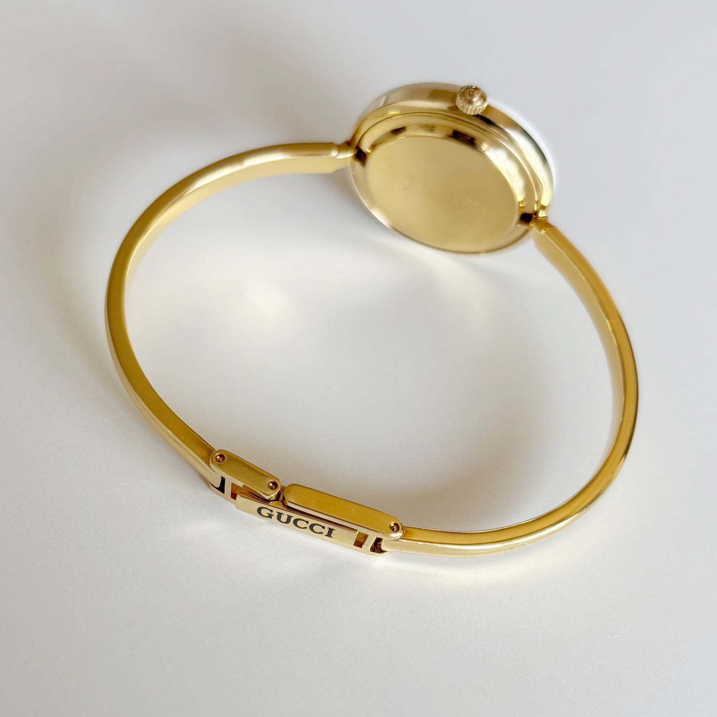 Gucci 1990s Interchangeable Bezel Gold Plated Bangle Watch with 12 bezels, case