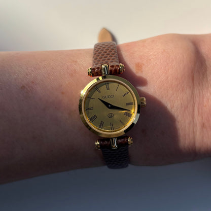 Gucci 1990s Round Gold Dial Gold Plated Watch