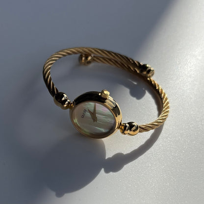Gucci 1990s Seashell Dial Gold Plated Cable Bangle Watch