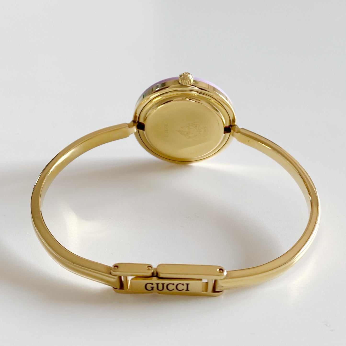 Gucci 1990s Interchangeable Bezel Gold Plated Bangle Watch with 12 bezels, case