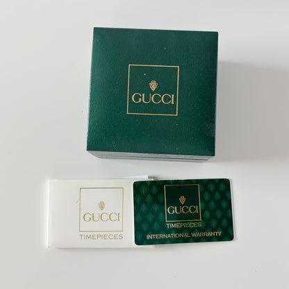 Gucci 1990s Interchangeable Bezel Gold Plated Bangle Watch with 12 bezels, case