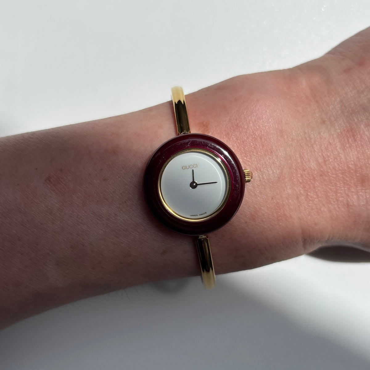 Gucci 1990s Interchangeable Bezel Gold Plated Bangle Watch with 12 bezels, case