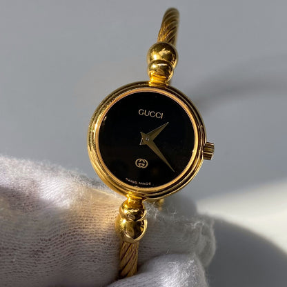 Gucci 1990s Black Dial Gold Plated Bangle Watch