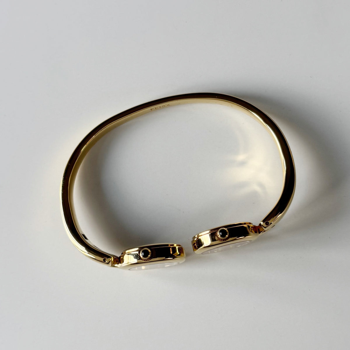 Fendi 1990s Seashell Dial Two Time Zone Gold Plated Bangle Watch