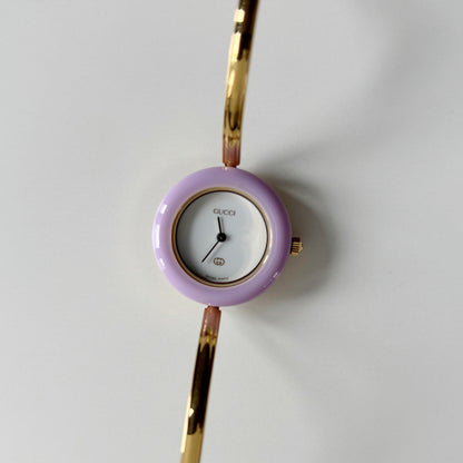 Gucci 1990s Interchangeable Bezel Gold Plated Bangle Watch with 12 bezels, case