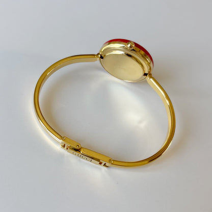 Gucci 1990s Interchangeable Bezel Gold Plated Bangle Watch with 12 bezels, case