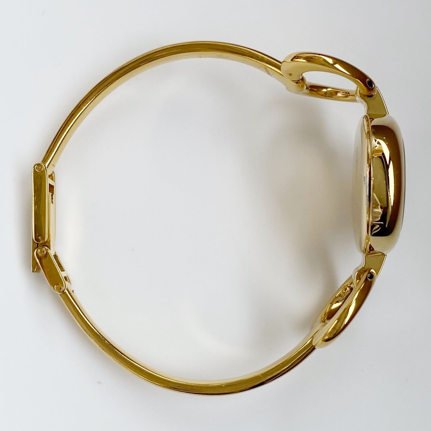 Gucci 1990s Oval Gold Plated Bangle Watch