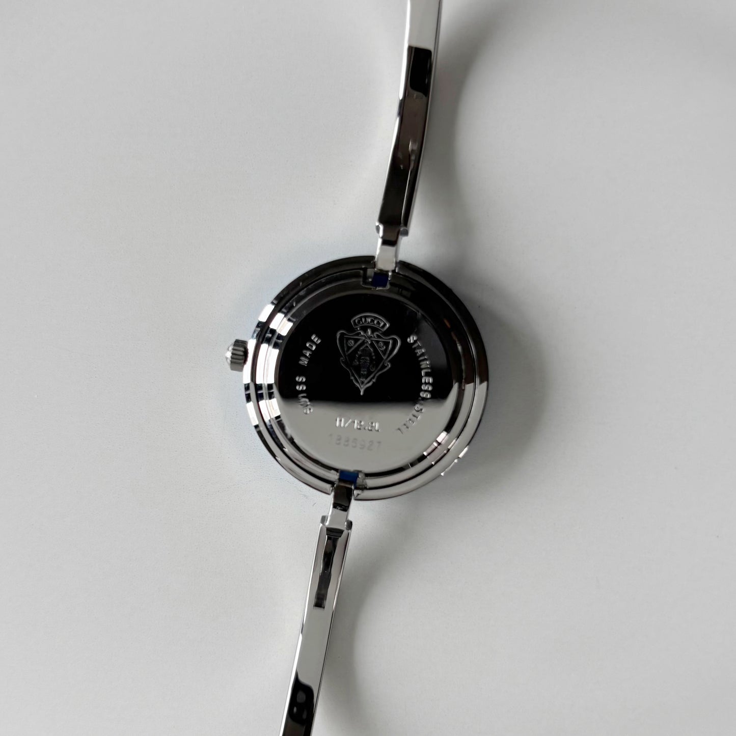 Gucci 1990s Interchangeable Bezel Silver Stainless steel Bangle Watch with 12 bezels, case