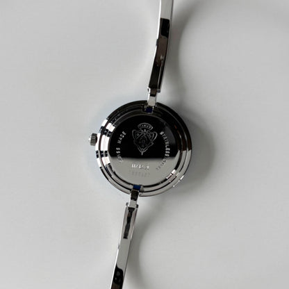Gucci 1990s Interchangeable Bezel Silver Stainless steel Bangle Watch with 12 bezels, case