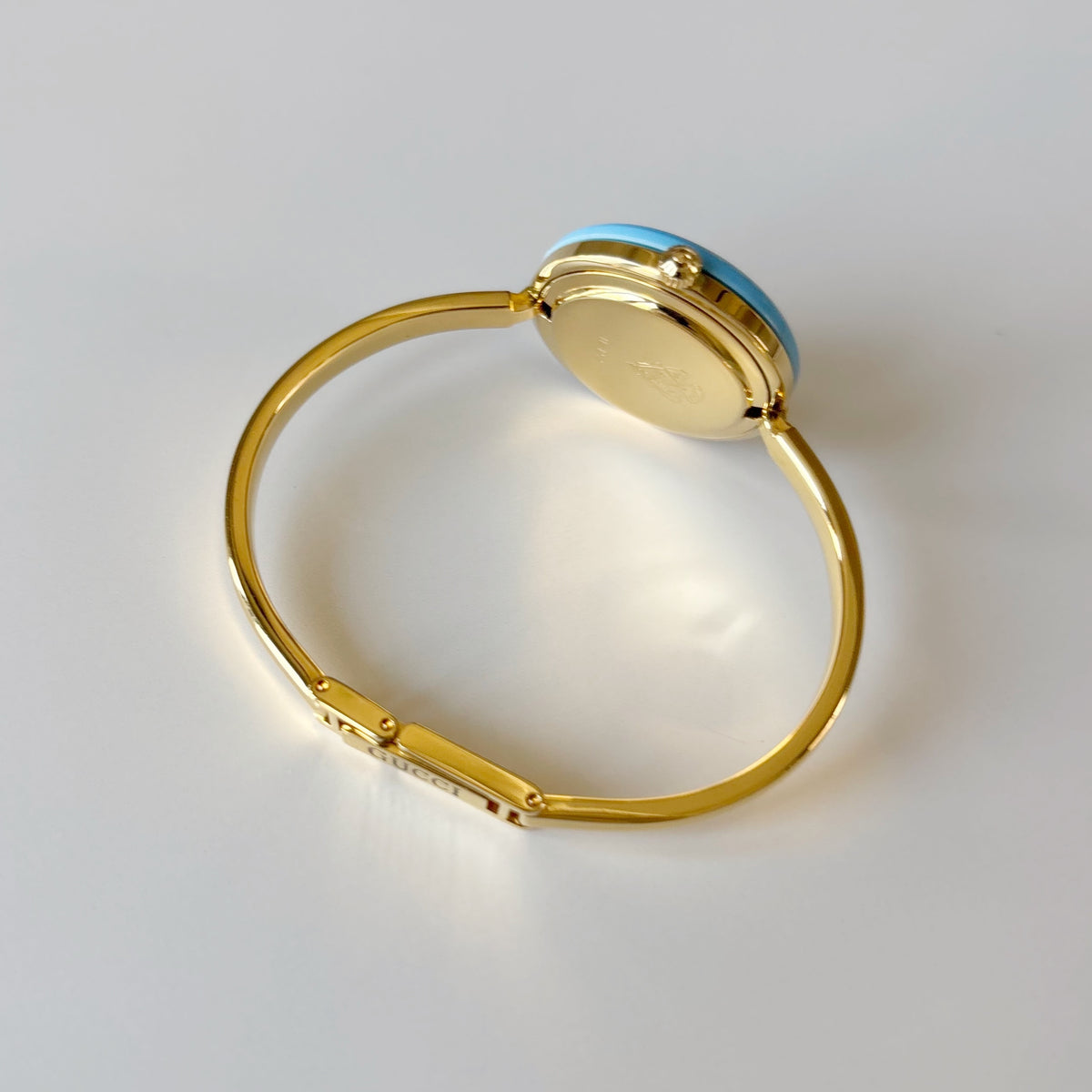 Gucci 1990s Interchangeable Bezel Gold Plated Bangle Watch with 12 bezels, case (Small)