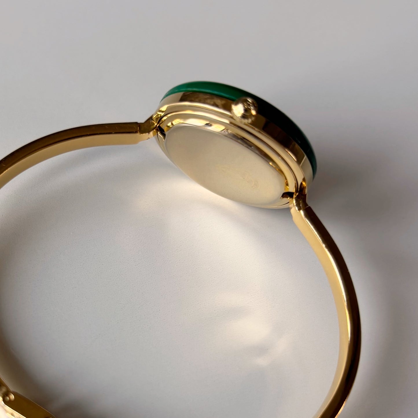 Gucci 1990s Interchangeable Bezel Gold Plated Bangle Watch with 12 bezels, case