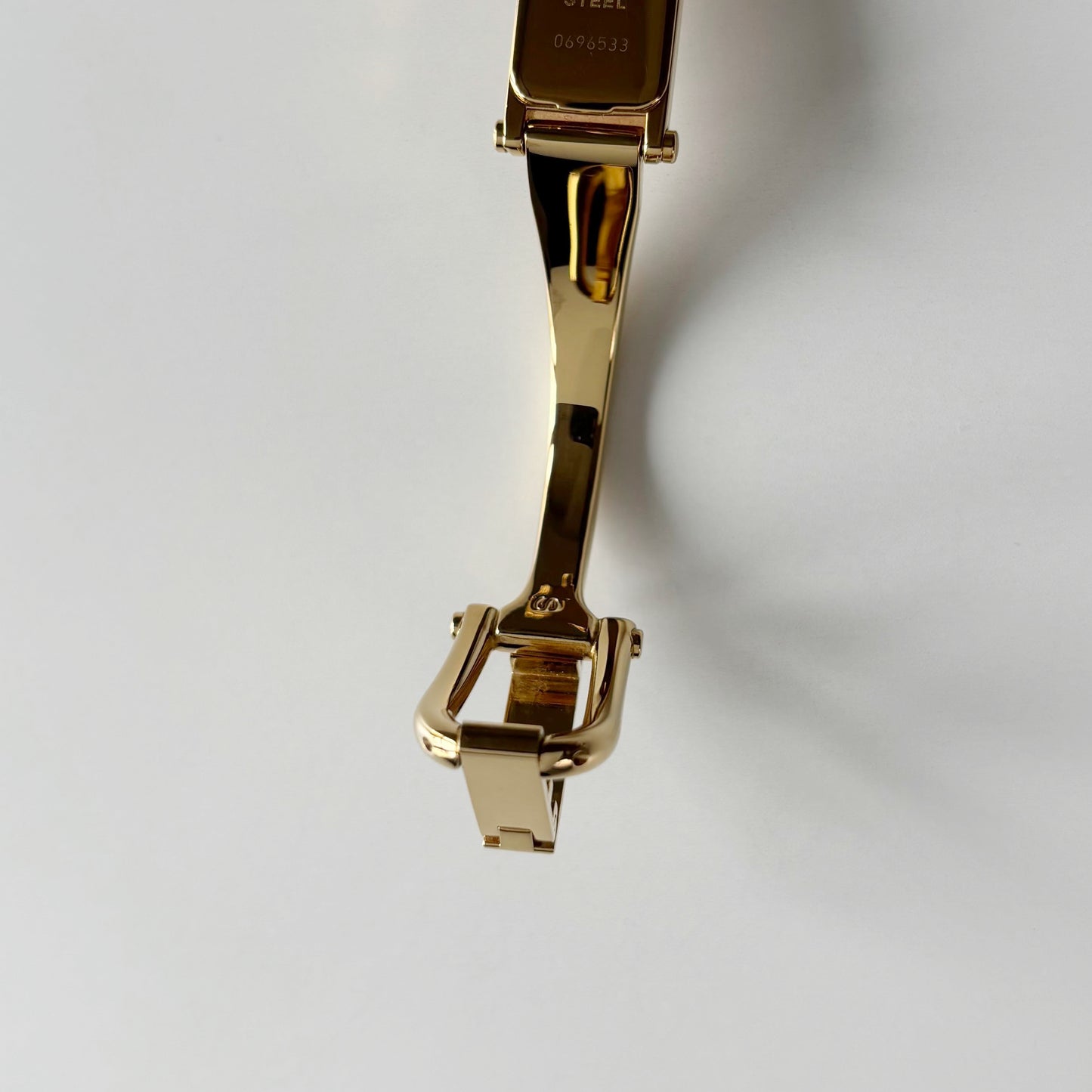 Gucci 1990s Gold Rectangular Dial Gold Plated Bangle Watch (Small)