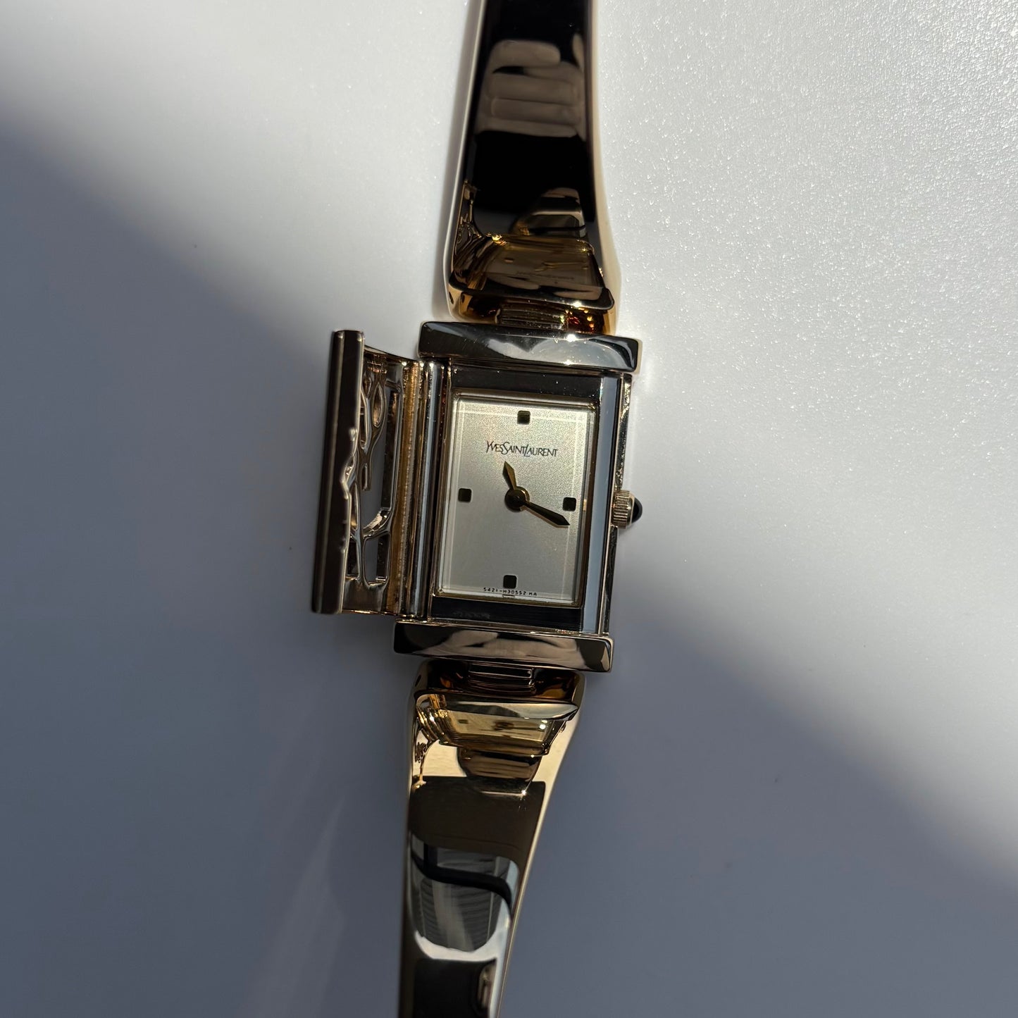 Yves Saint Laurent 1990s Peek-A-Boo Gold Plated Bangle Watch