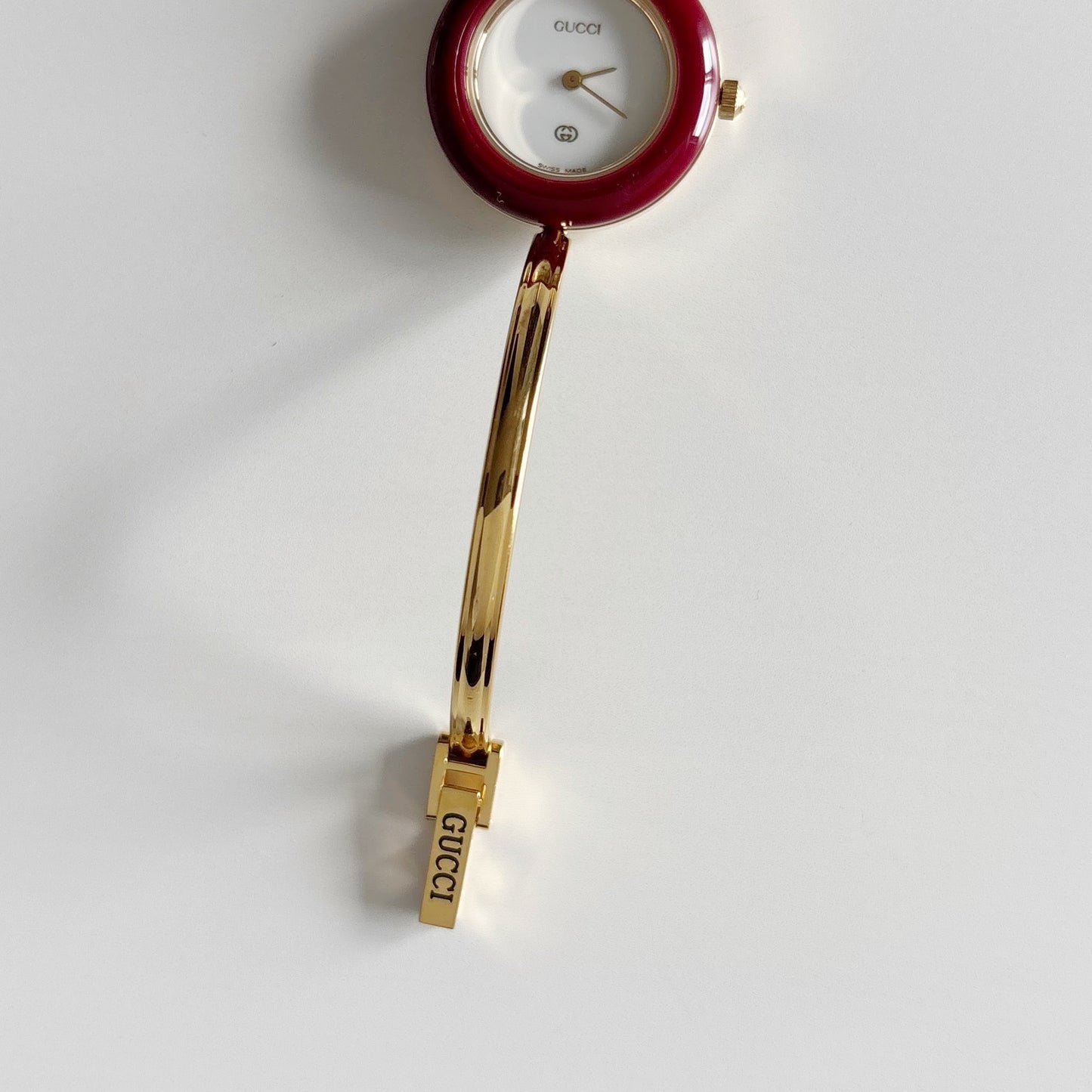 Gucci 1990s Interchangeable Bezel Gold Plated Bangle Watch with 12 bezels, case