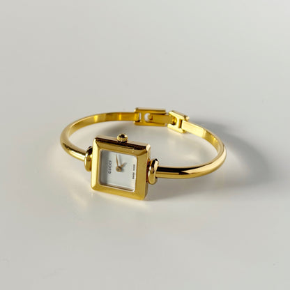 Gucci 1990s Square Dial Gold Plated Bangle Watch