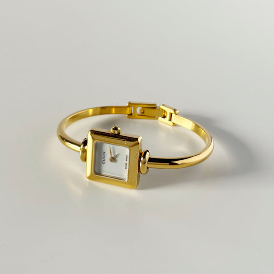 Gucci 1990s Square Dial Gold Plated Bangle Watch