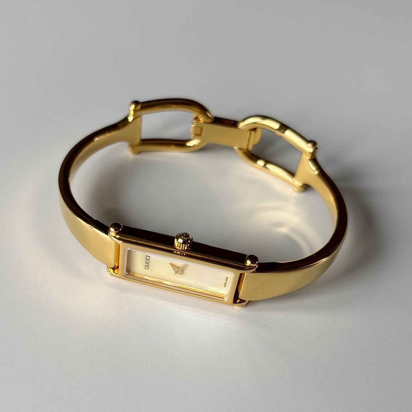 Gucci 1990s Seashell Rectangular Dial Gold Plated Bangle Watch