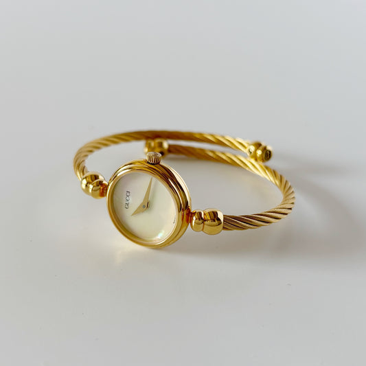 Gucci 1990s Seashell Dial Gold Plated Cable Bangle Watch