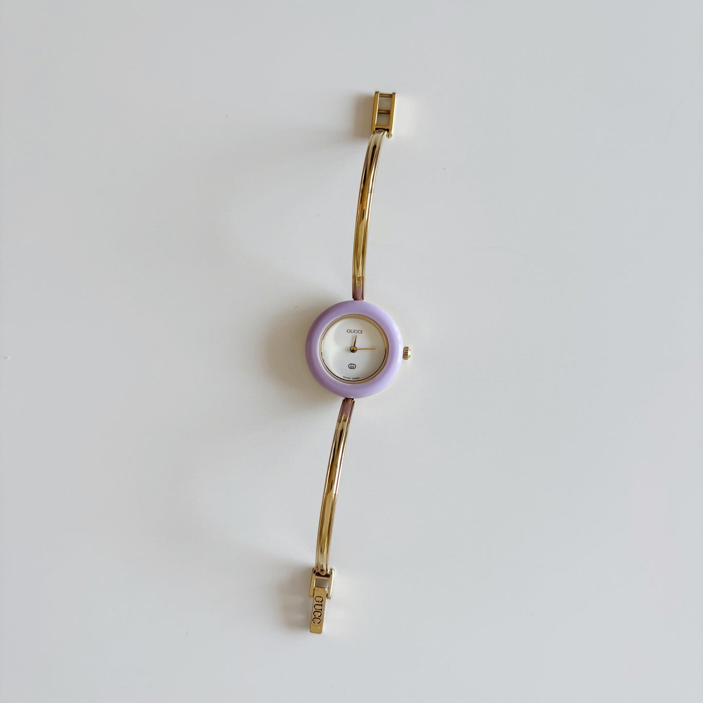 Gucci 1990s Interchangeable Bezel Gold Plated Bangle Watch with 12 bezels, case