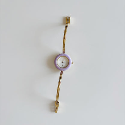 Gucci 1990s Interchangeable Bezel Gold Plated Bangle Watch with 12 bezels, case