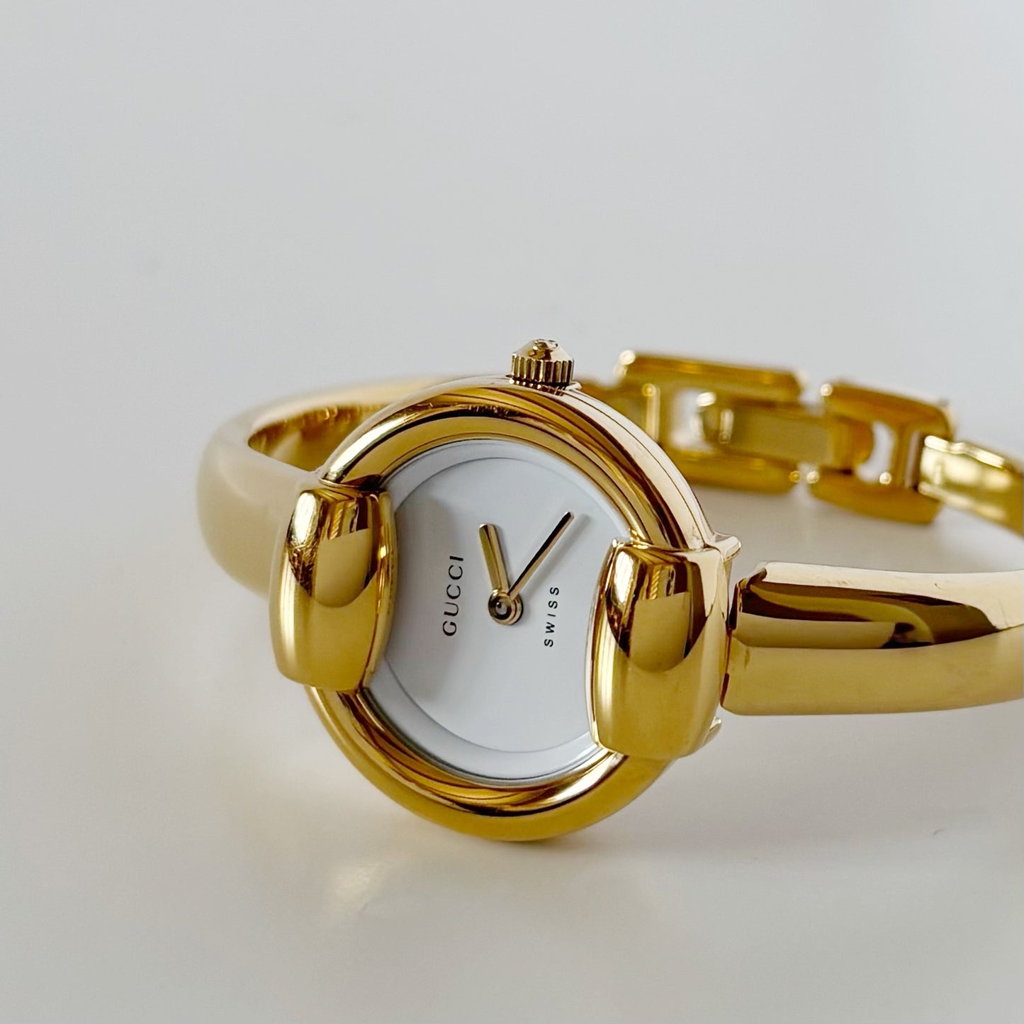Gucci 1990s Round Dial Gold Plated Bangle Watch (Small)
