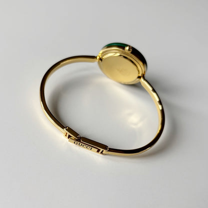 Gucci 1990s Interchangeable Bezel Gold Plated Bangle Watch with 12 bezels, case