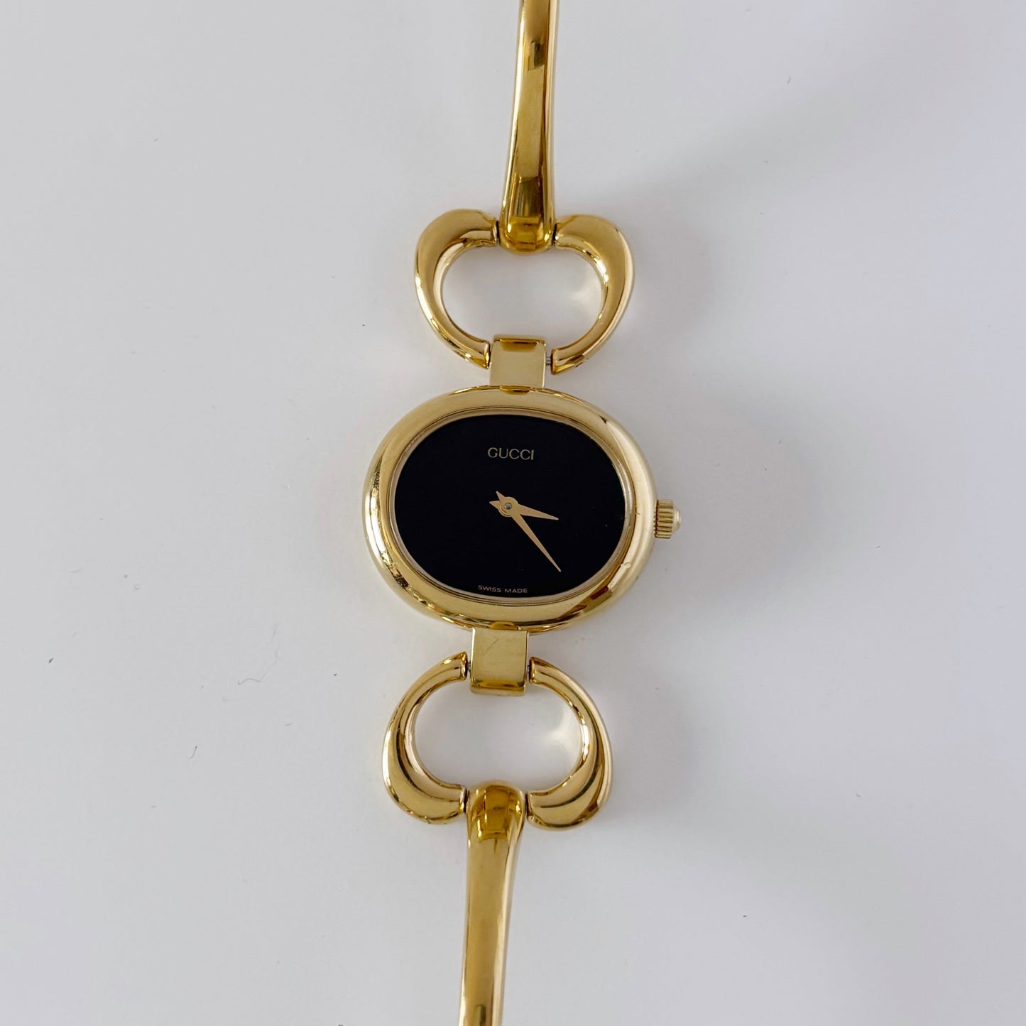 Gucci 1990s Black Dial Gold Plated Bangle Watch