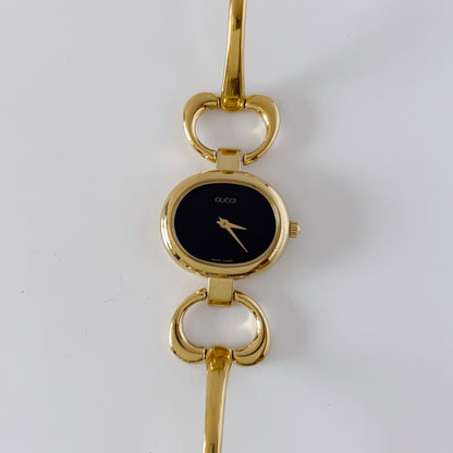 Gucci 1990s Black Dial Gold Plated Bangle Watch