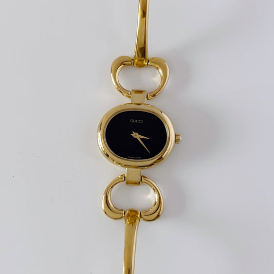 Gucci 1990s Black Dial Gold Plated Bangle Watch