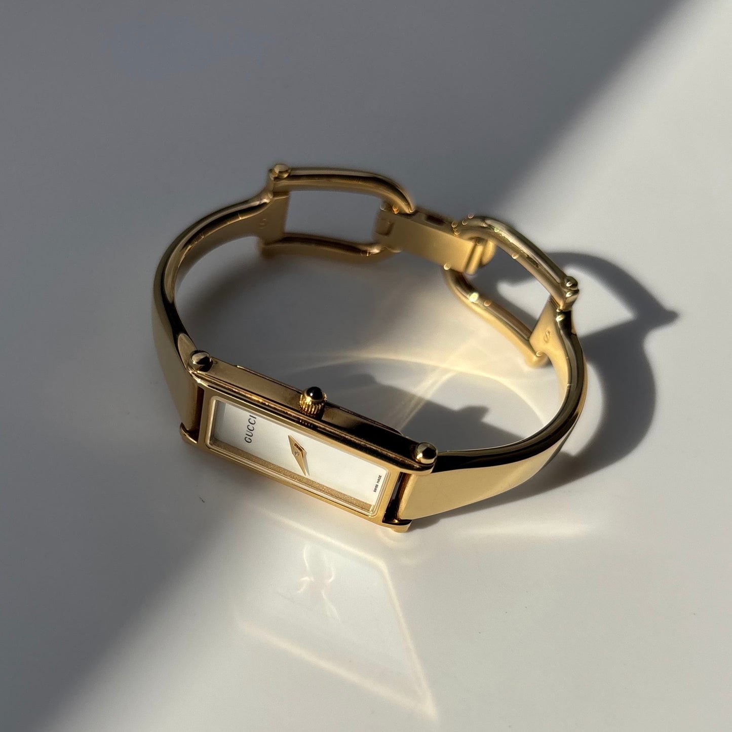 Gucci 1990s Seashell Rectangular Dial Gold Plated Bangle Watch (Small)