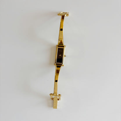 Gucci 1990s Black Dial Gold Plated Bangle Watch