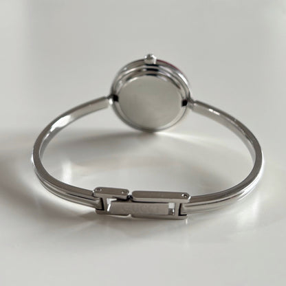 Gucci 1990s Interchangeable Bezel Stainless steel Bangle Watch with 12 bezels, case