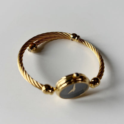 Gucci 1990s Black Dial Gold Plated Cable Bangle Watch