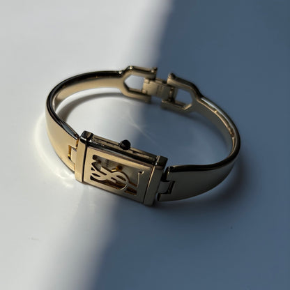 Yves Saint Laurent 1990s Peek a boo Gold Plated Bangle Watch