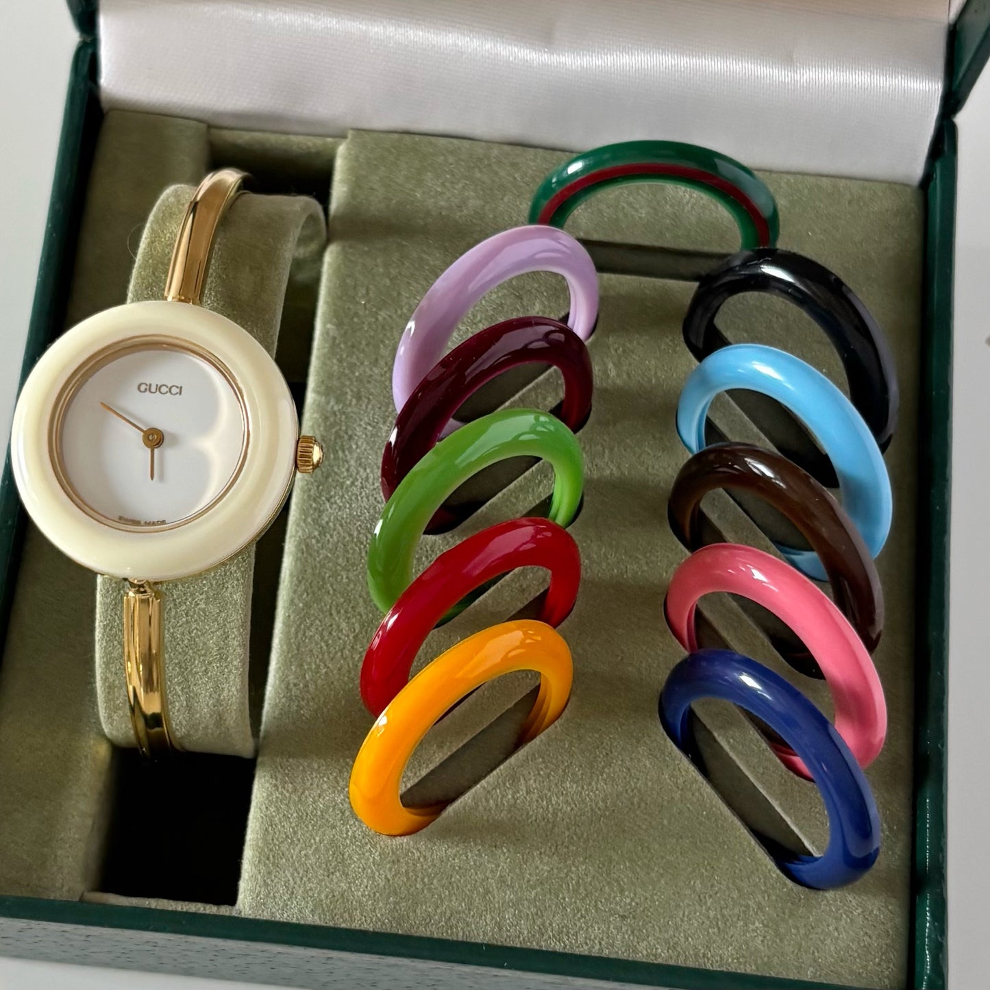Gucci 1990s Interchangeable Bezel Gold Plated Bangle Watch with 12 bezels, case