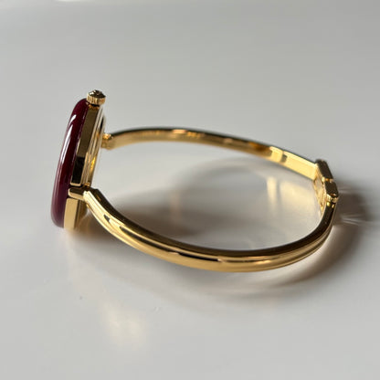 Gucci 1990s Interchangeable Bezel Gold Plated Bangle Watch with 12 bezels, case