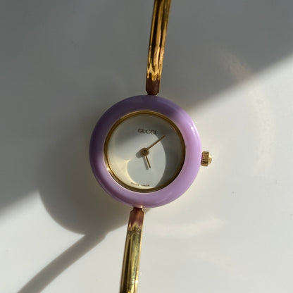 Gucci 1990s Interchangeable Bezel Gold Plated Bangle Watch with 12 bezels, case