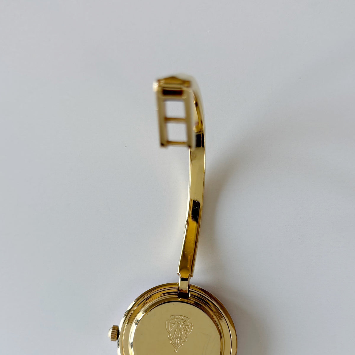 Gucci 1990s Interchangeable Bezel Gold Plated Bangle Watch with 12 bezels, case
