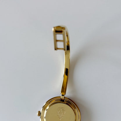 Gucci 1990s Interchangeable Bezel Gold Plated Bangle Watch with 12 bezels, case