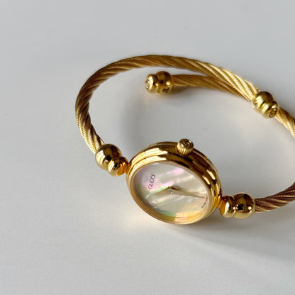 Gucci 1990s Seashell Dial Gold Plated Cable Bangle Watch