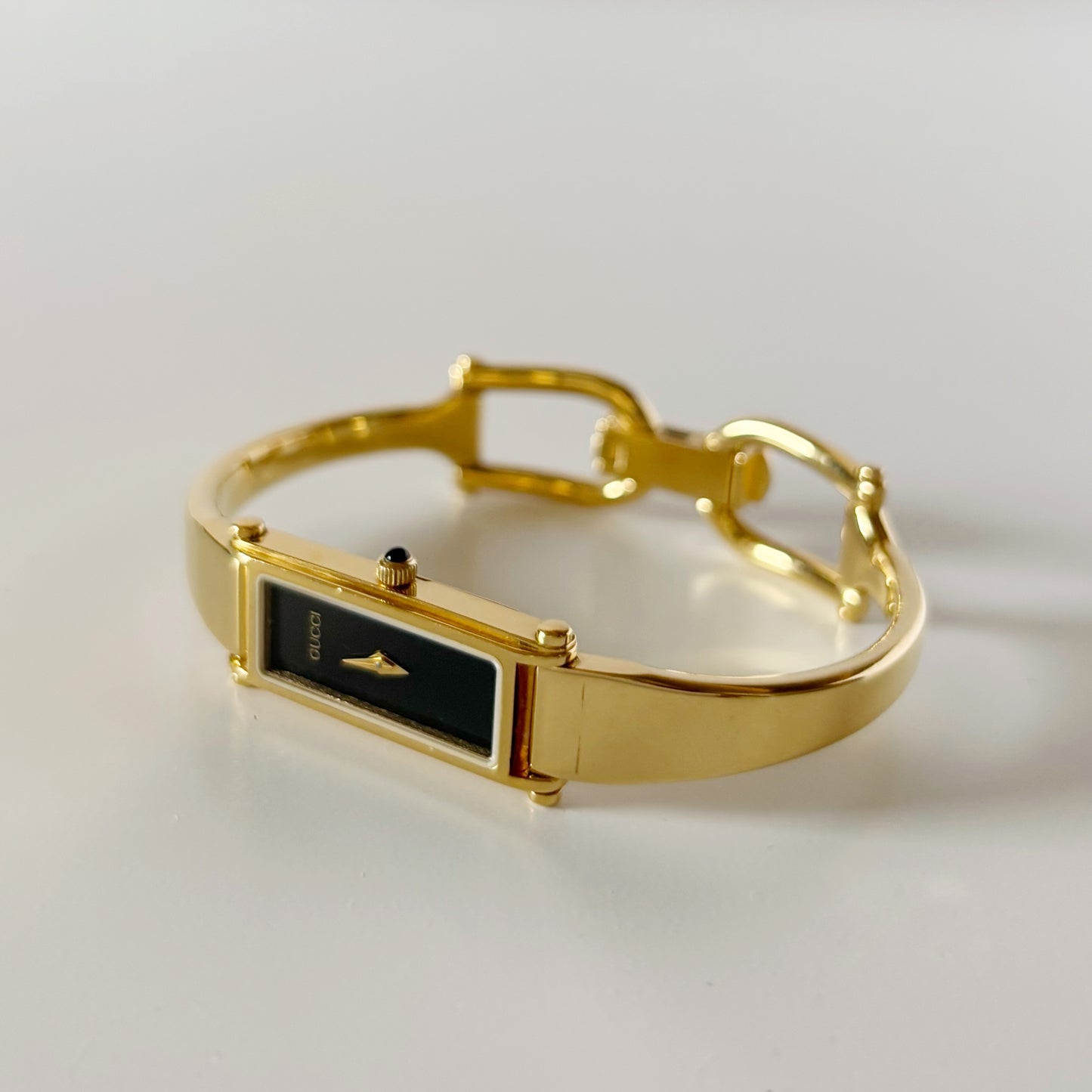 Gucci 1990s Black Dial Gold Plated Bangle Watch