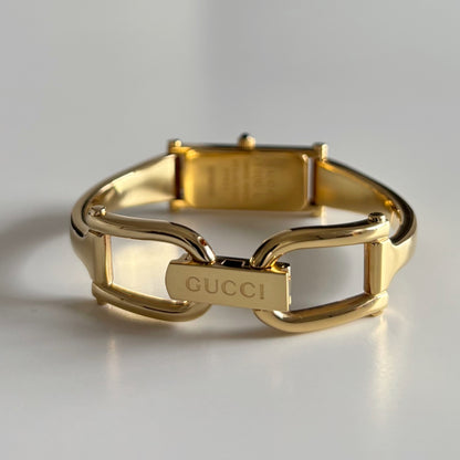 Gucci 1990s Seashell Rectangular Dial Gold Plated Bangle Watch (Small)