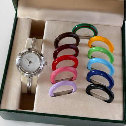 Gucci 1990s Interchangeable Bezel Stainless steel Bangle Watch with 12 bezels, case (Small)