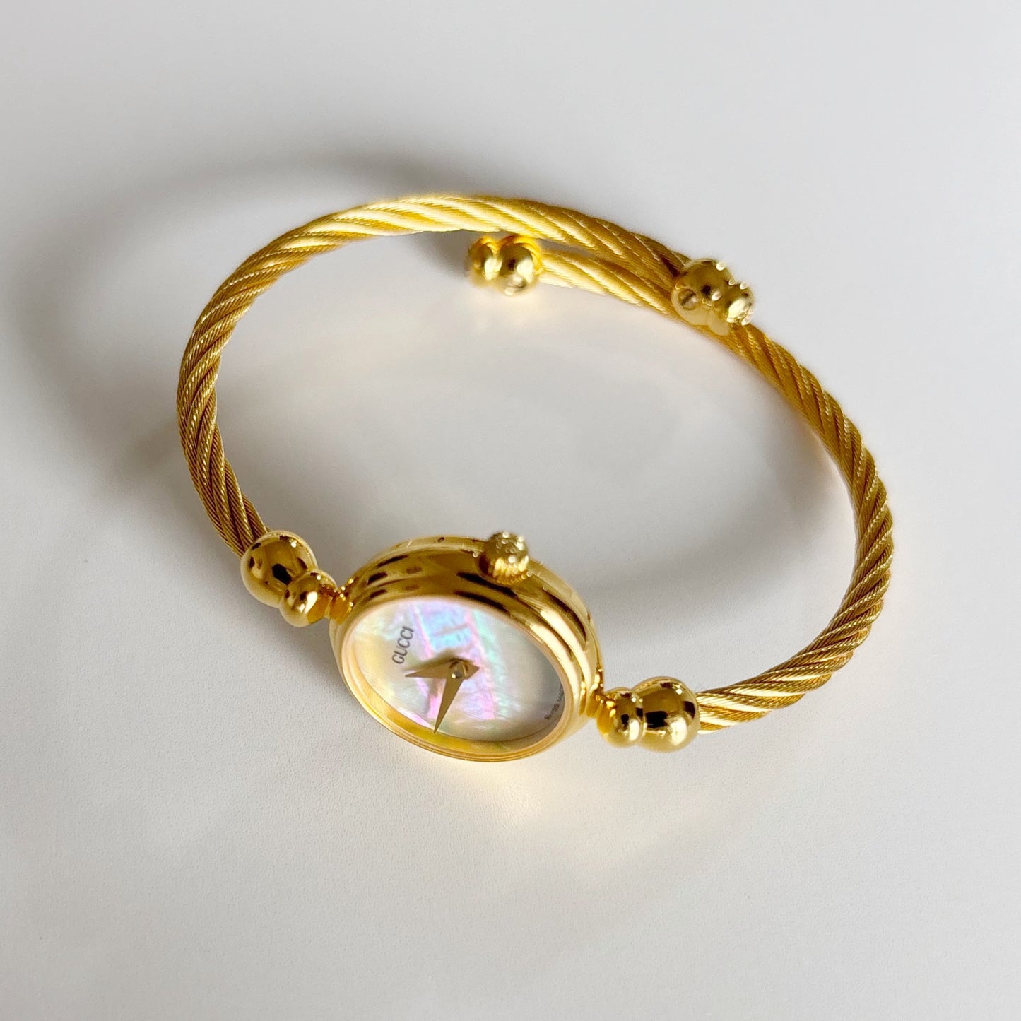 Gucci 1990s Seashell Dial Gold Plated Cable Band Bangle Watch