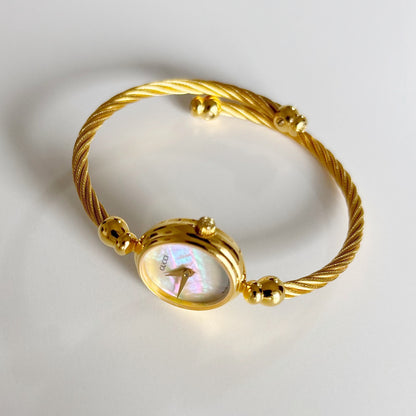 Gucci 1990s Seashell Dial Gold Plated Cable Band Bangle Watch
