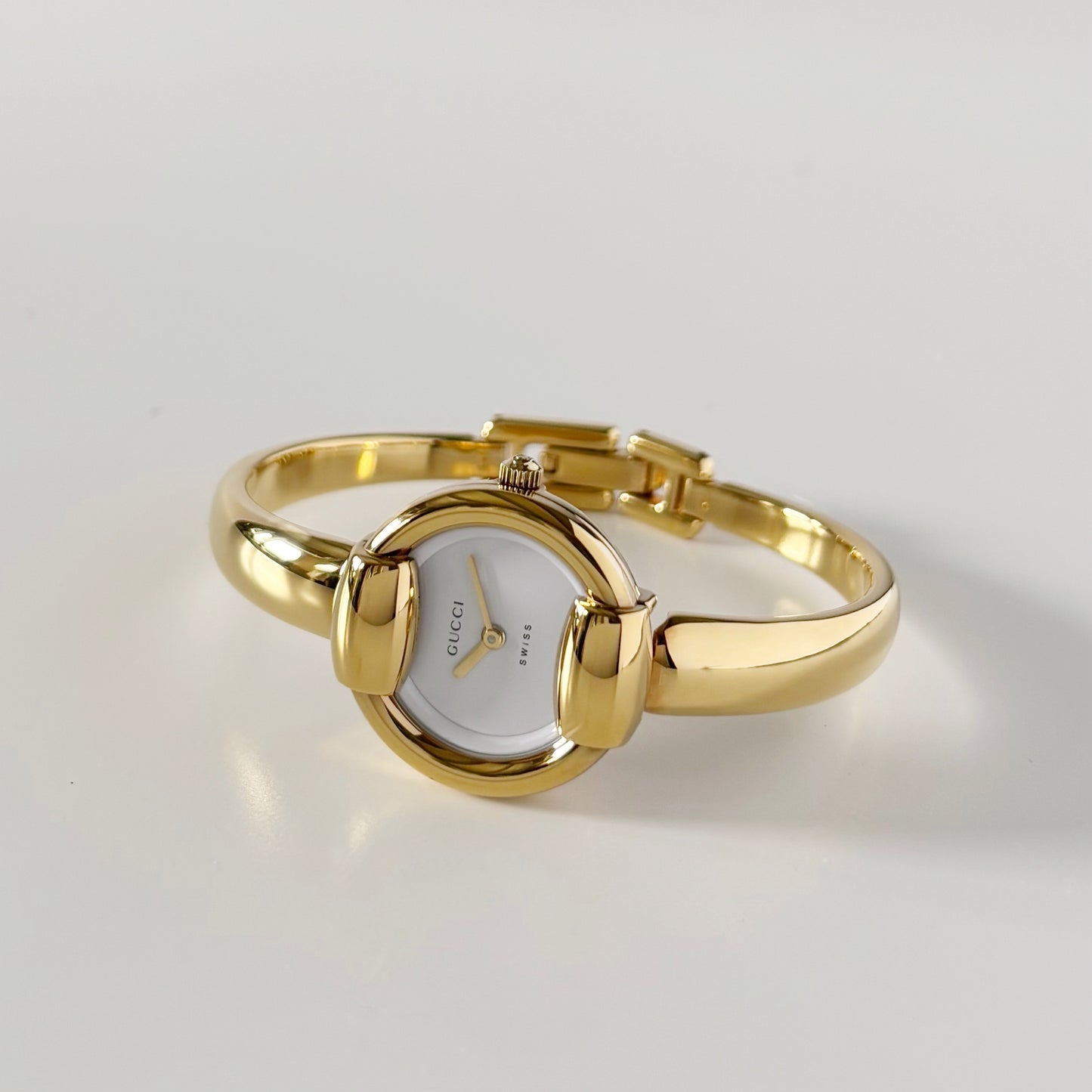 Gucci 1990s Round Dial Gold Plated Bangle Watch