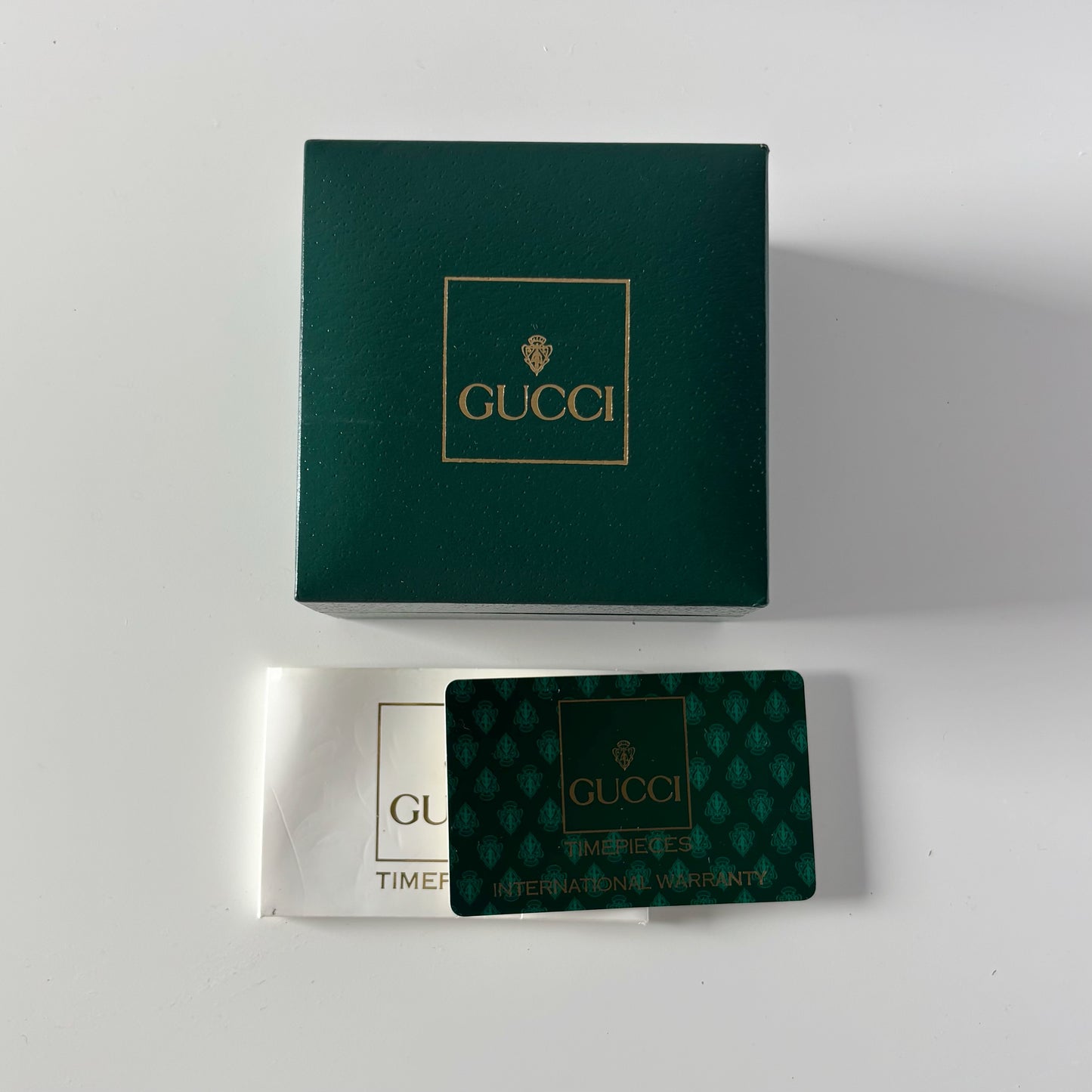 Gucci 1990s Interchangeable Bezel Gold Plated Bangle Watch with 12 bezels, case