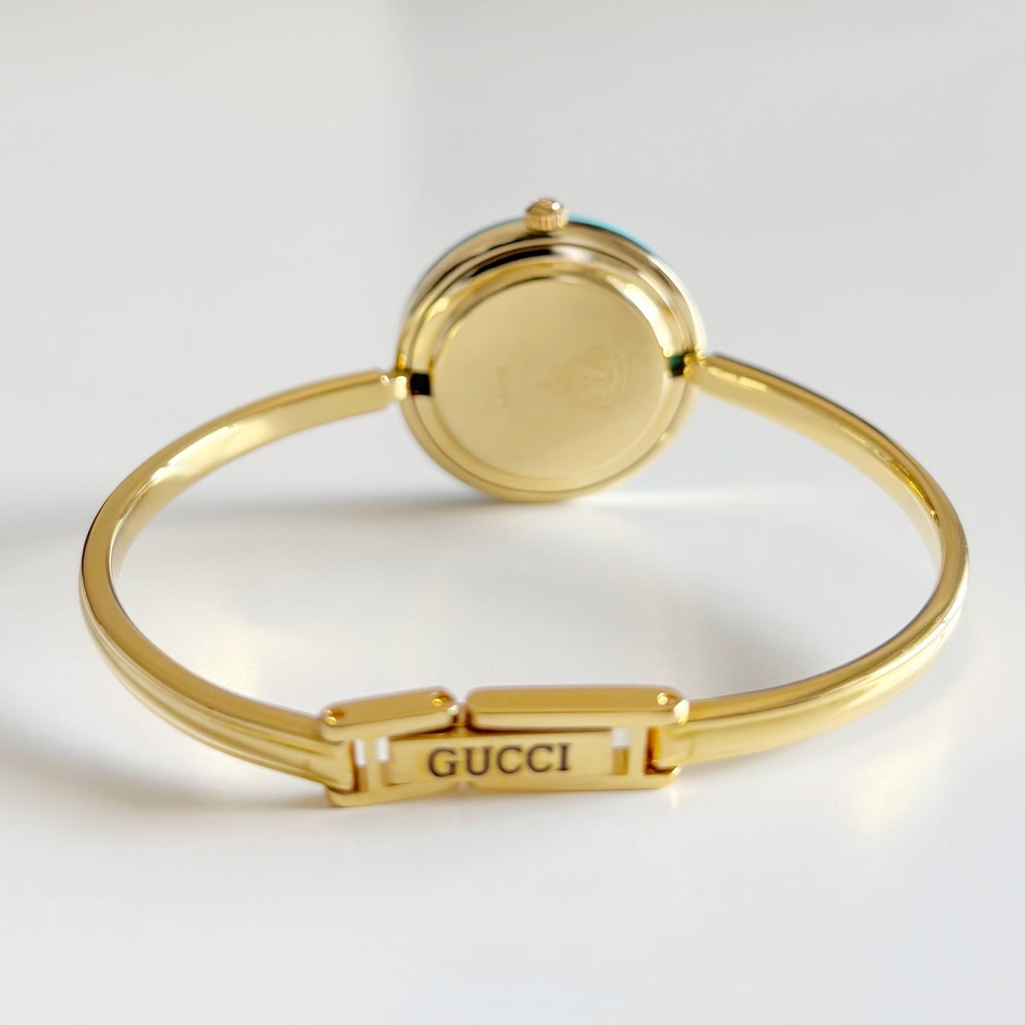 Gucci 1990s Interchangeable Bezel Gold Plated Bangle Watch with 12 bezels, case